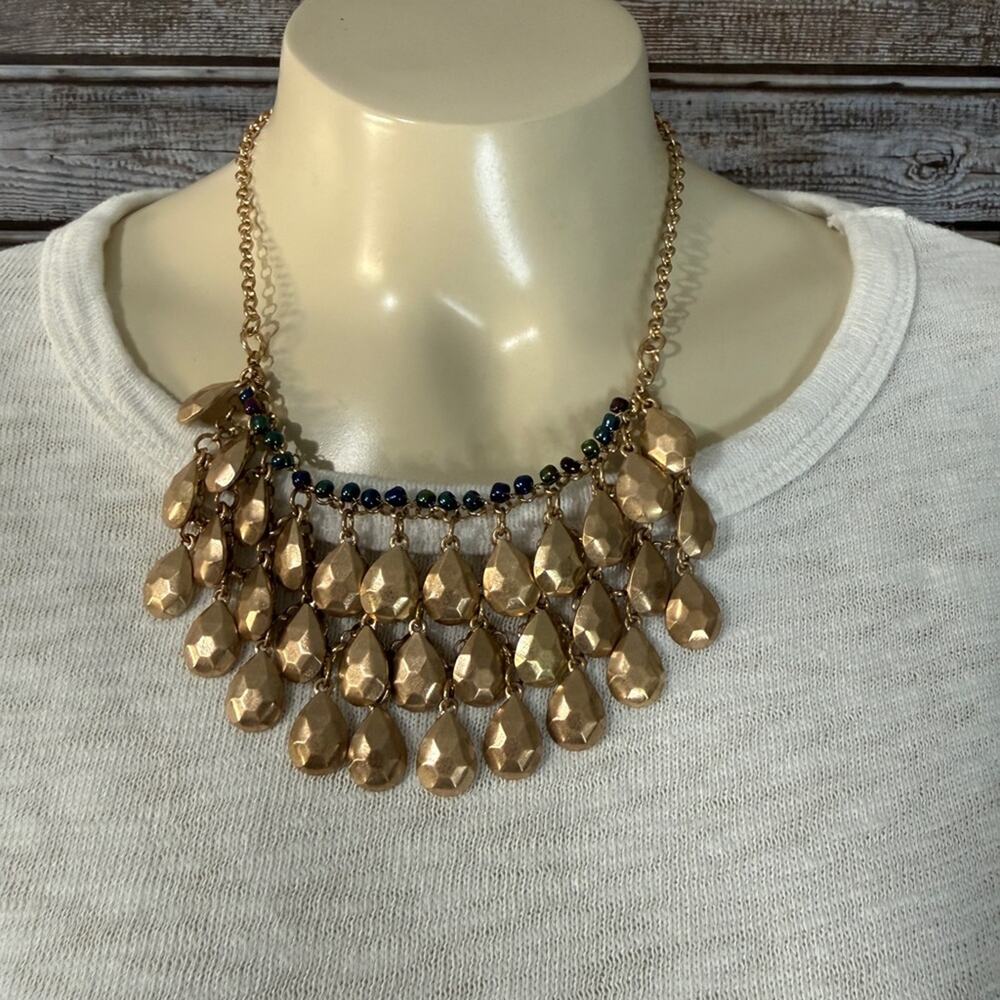 Gorgeous Gold Tone drop necklace with purple blue iridescent beads